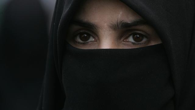 Le Conseil national considère que l'interdiction du port de la burqa serait une mesure excessive. [Shakil Adil]