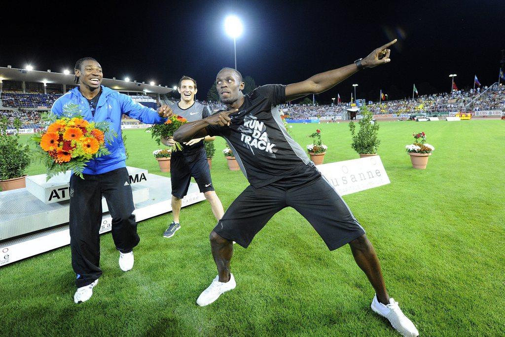 Yohan Blake, Renaud Lavillenie et Usain Bolt se sont partagés la vedette à l'applaudimètre. [Keystone - JEAN-CHRISTOPHE BOTT]