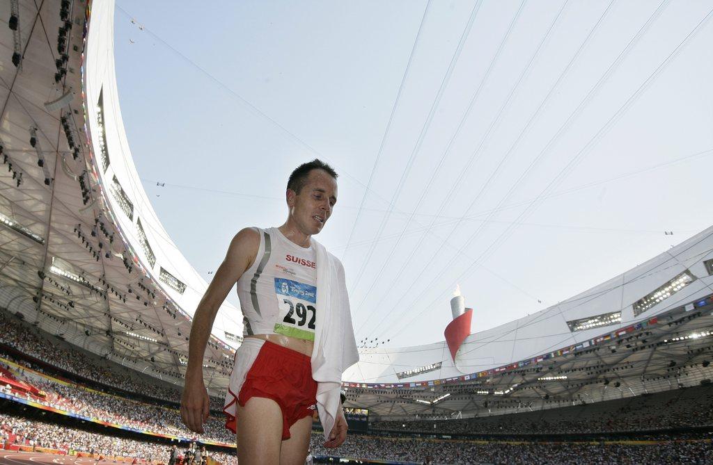 Viktor Roethlin était allé au bout de lui-même lors du marathon olympique il y a 4 ans à Pékin. [KEYSTONE - PETER KLAUNZER]