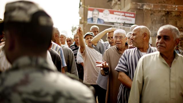 Les Egyptiens ont commencé à voter en nombre, comme ici dans la périphérie du Caire. [Pete Muller]