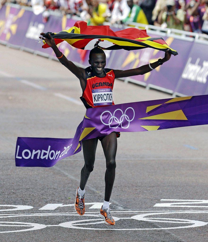 A la surprise générale, Kiprotich a devancé les favoris kenyans pour s'imposer lors du marathon olympique. [KEYSTONE - Mike Groll]