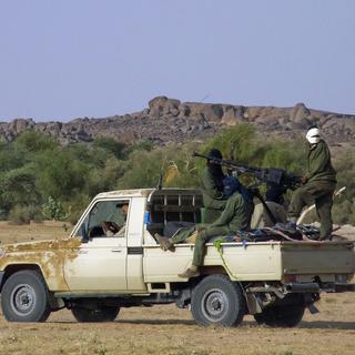 A file photograph dated 18 October 2011 shows Tuareg rebel fighters moving through northern Mali on a vehicle carrying a large calibre weapon near Kidal, Mali. Reports on 01 April 2012 indicate that Tuareg separatist rebels in Mali have taken control of the northern town of Timbuktu after a rapid advance through the north of Mali in recent weeks following the 21 March coup. EPA/STR