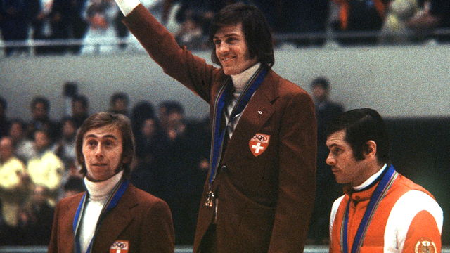 Bernhard Russi (centre) et Roland Collombin (gauche), un doublé mémorable. [Keystone]