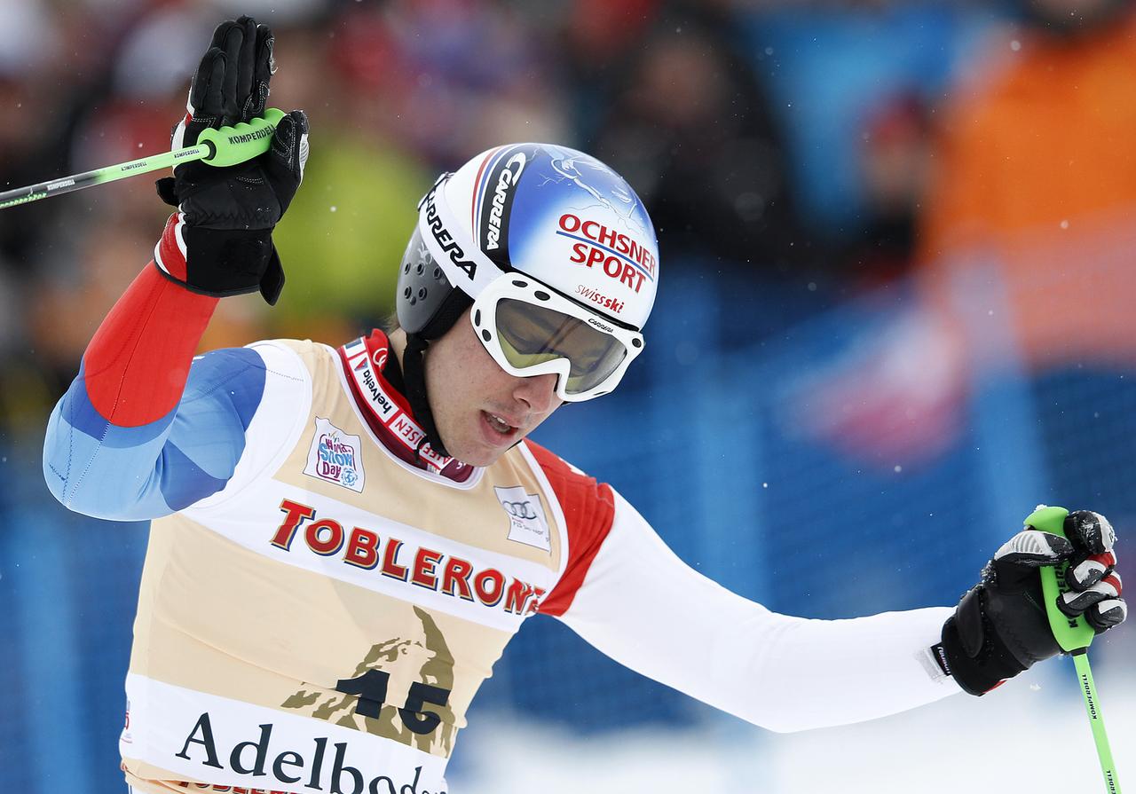 Carlo Janka of Switzerland reacts after competing in the men's alpine skiing World Cup giant slalom race in Adelboden January 7, 2012. REUTERS/Michael Buholzer (SWITZERLAND - Tags: SPORT SKIING) [Michael Buholze]