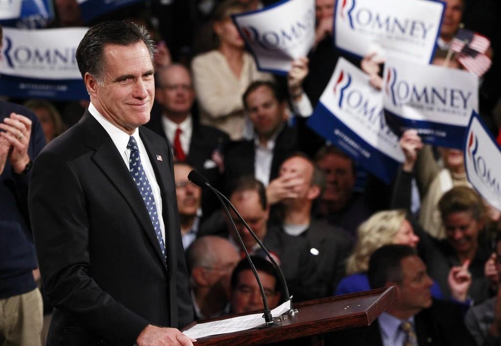 Mitt Romney savoure sa victoire devant ses partisans réunis à son QG de campagne. [Charles Dharapak]