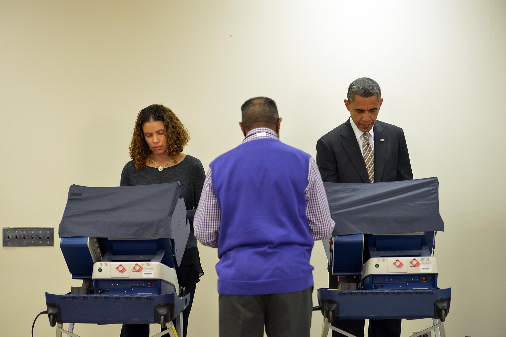 "Je ne peux pas vous dire pour qui j'ai voté", a plaisanté Barack Obama. [Mandel Ngan]