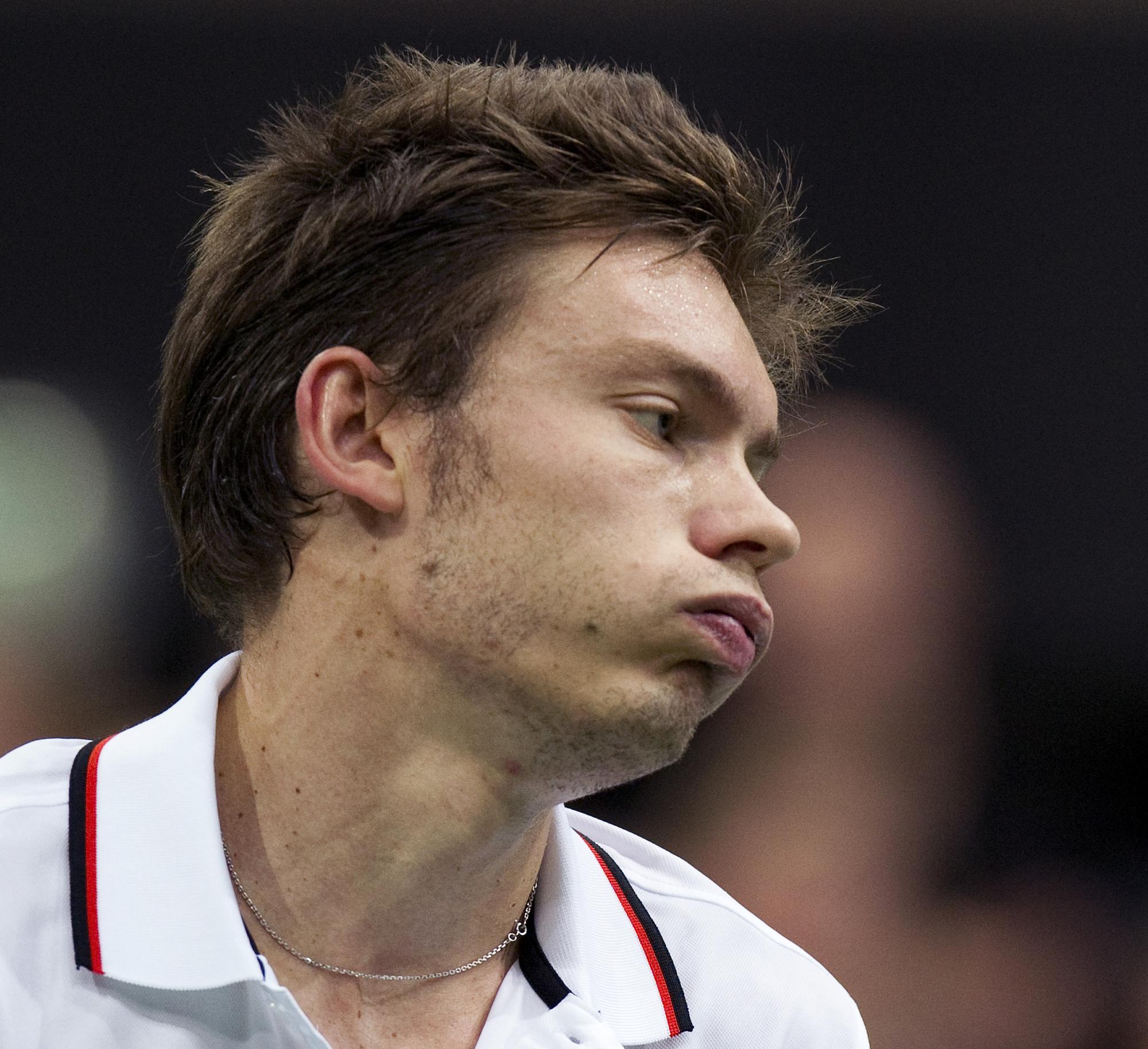 Nicolas Mahut of France reacts during his men's singles tennis match against Roger Federer of Switzerland at the World Indoor Tournament in Rotterdam February 15, 2012. Federer beat Mahut 6-4 6-4. REUTERS/Paul Vreeker/United Photos (NETHERLANDS - Tags: SPORT TENNIS) [Paul Vreeker]