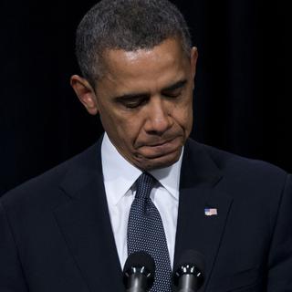 Barack Obama parle d'une situation "intolérable" en matière de protection des enfants. [AP/Keystone - Evan Vucci]