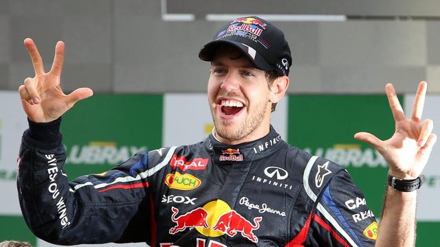 Vettel a dominé le monde de la F1 pour la troisième fois d'affilée en 2012. [KEYSTONE - JENS BUETTNER]