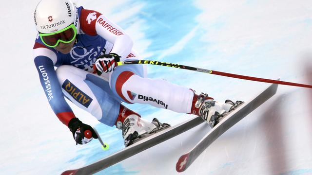 Switzerland Fabienne Suter races to the third place, during an alpine ski, women's World Cup downhill, in Bad Kleinkirchheim, Austria, Saturday Jan. 7, 2012. (AP Photo/Marco Trovati) [KEYSTONE - Marco Trovati]