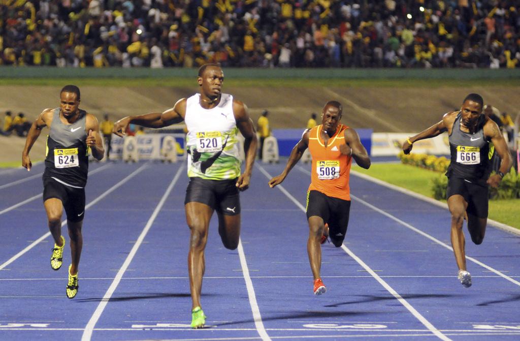 Usain Bolt avait réussi un superbe 9"84 le 9 mai dernier. [Keystone - Bryan Cummings]