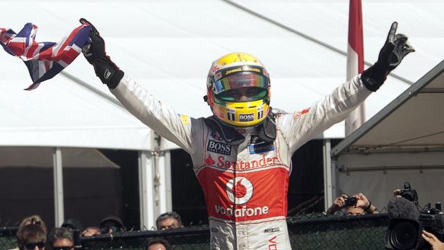 McLaren Mercedes' Lewis Hamilton, of Britain, stands on his car after winning Formula One's Canadian Grand Prix auto race at Circuit Gilles Villeneuve on Sunday, June 10, 2012, in Montreal. (AP Photo/The Canadian Press, Jacques Boissinot) [KEYSTONE - Jacques Boissinot]