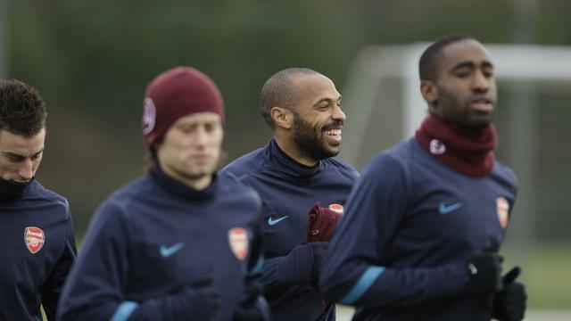 Thierry Henry et Johan Djourou se rendront à Milan, aidés par la poisse des Milanais face aux Anglais.. [KEYSTONE - Matt Dunham]