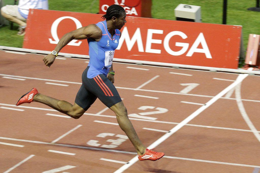 Sur la ligne, Yohan Blake a bien conscience d'avoir réussi un très gros temps en jetant un oeil au chronomètre. [SALVATORE DI NOLFI]