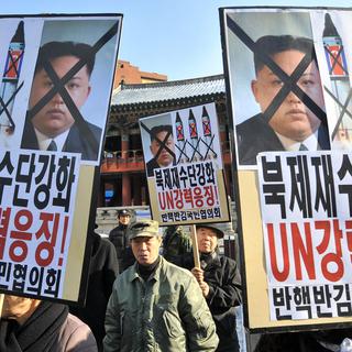 Des Sud-Coréens ont manifesté ce mercredi 12.12.2012 à Séoul, après le tir de la fusée nord-coréenne. [Jung Yeon-Je]