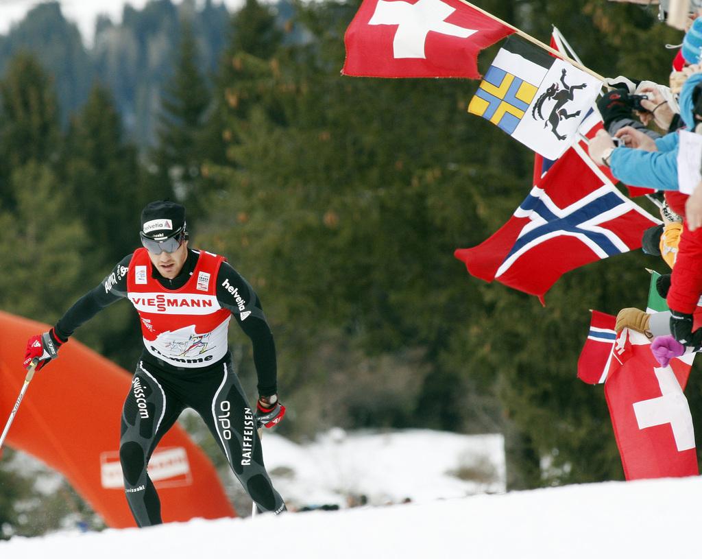 L'an dernier, Dario Cologna avait parachevé sa victoire dans la terrible montée vers l'Alpe Cermis. [KEYSTONE - Armando Trovati]