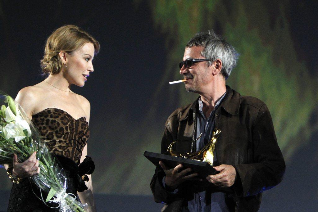 La chanteuse Kylie Minogue, qui joue dans le dernier film de Leos Carax, était à ses côtés. [KEYSTONE - Urs Flueeler]