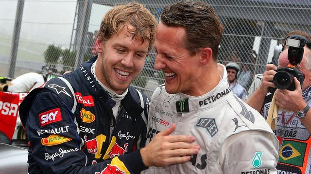 Sebastian Vettel et Michael Schumacher: dix titres mondiaux à eux deux. [KEYSTONE - Ricardo Mazalan]