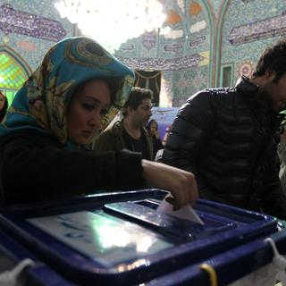 Le bureau de vote en Iran sont restés ouverts bien plus tard que prévu, à cause d'une influence massive de votant, selon le gouvernement. [ATTA KENARE]