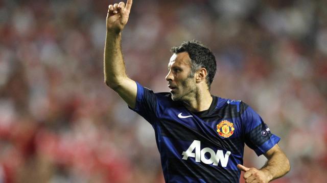 Ryan Giggs jouera une 22e saison à Manchester United, à 38 ans. [Keystone - Armando Franca]