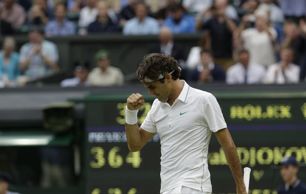 Joie contenue pour Federer, le plus dur reste à faire. [KEYSTONE - Anja Niedringhaus]