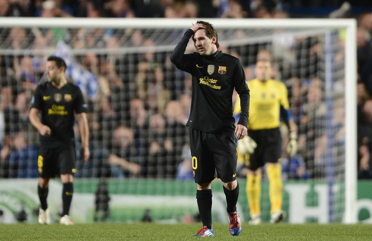 Lionel Messi of Barcelona reacts after Chelsea scored during their Champions League semi-final first leg soccer match at Stamford Bridge in London April 18, 2012. REUTERS/Dylan Martinez (BRITAIN - Tags: SPORT SOCCER) [Dylan Martinez]