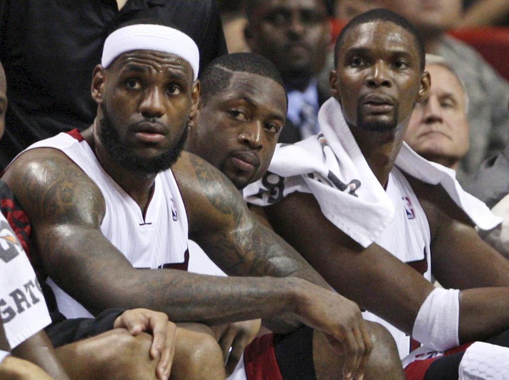 James, Wade et Bosh, moins inspirés que d'habitude, ont précipité la défaite du Heat. [Wilfredo Lee]