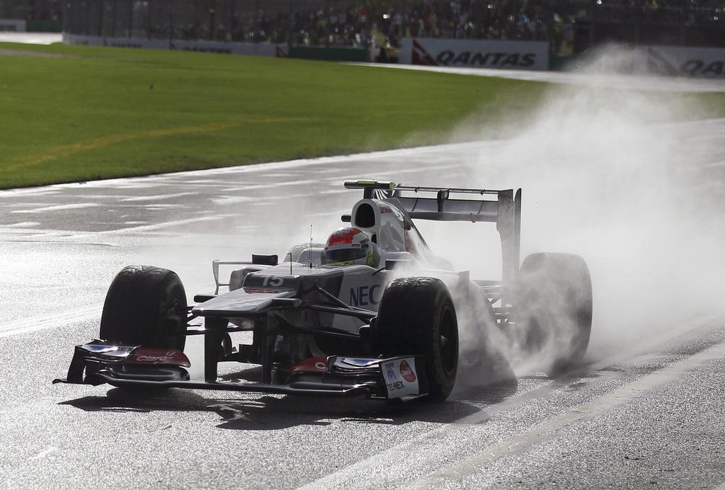 Sergio Perez et les Sauber ont tiré leur épingle du jeu sur la piste détrempée. [KEYSTONE - Rob Griffith]