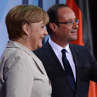 Angela Merkel et François Hollande n'ont pas caché leurs divergences mardi lors de leur première rencontre. [Rainer Jensen]