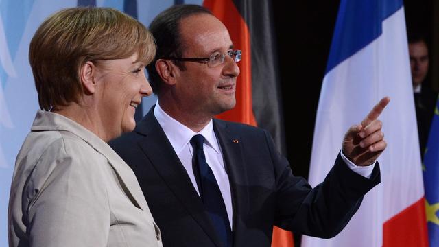 Angela Merkel et François Hollande n'ont pas caché leurs divergences mardi lors de leur première rencontre. [Rainer Jensen]