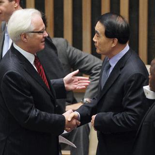 Les ambassadeurs russe et chinois à l'heure de leur veto devant le Conseil de sécurité. [Getty Images/AFP - Mario Tama]