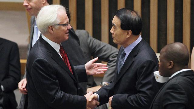 Les ambassadeurs russe et chinois à l'heure de leur veto devant le Conseil de sécurité. [Getty Images/AFP - Mario Tama]