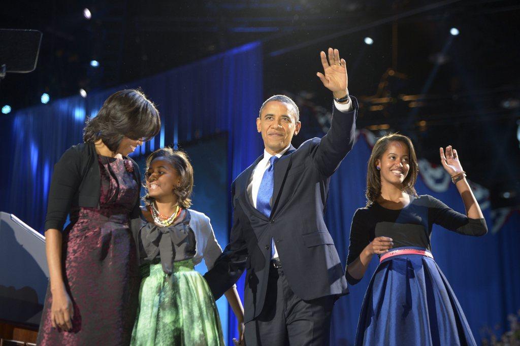 Barack Obama, accompagné de sa famille, s'est exprimé devant ses partisans. [Shwan Thew]