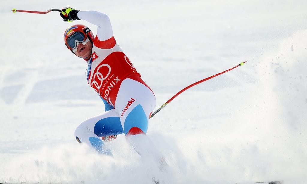 7.	epa03091330 Didier Cuche of Switzerland reacts after taking the seventh place in the men's Downhill race of the Alpine Skiing World Cup in les Houche, near Chamonix, France, 04 February 2012. EPA/OLIVIER HOSLET [Olivier Hoslet]