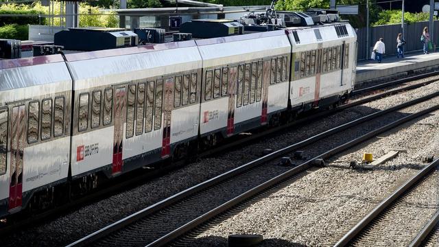 Le PDC veut lancer l'éco-billet pour les transports publics et tout particulièrement les CFF. [Jean-Christophe Bott]