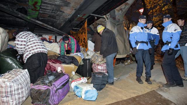 Evacuation d'un camp de Roms à Genève. [Salvatore Di Nolfi]