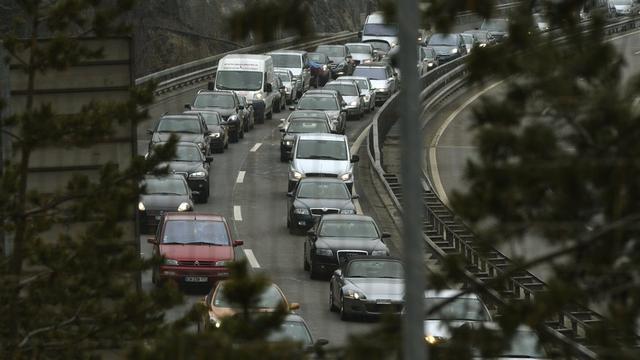 Le début du week-end avait déjà été marqué par les traditionnels bouchons au Gothard. [Urs Flueeler]