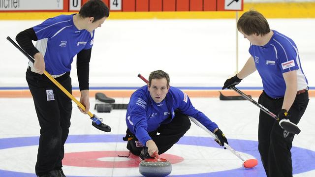 Sven Michel et ses équipiers devront balayer dur pour obtenir leur qualification pour Sotchi. [JEAN-CHRISTOPHE BOTT]