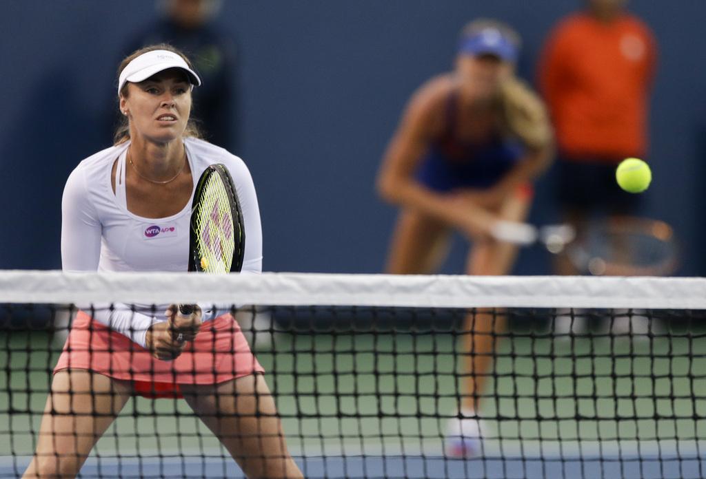 A 31 ans, Hingis n'a rien perdu de son coup d'oeil. [KEYSTONE - Chris Carlson]