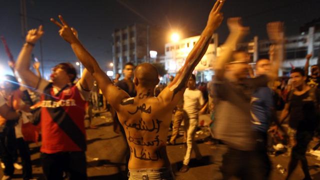 Dans les rues du Caire, les Egyptiens célèbrent l'éviction du président Mohamed Morsi. [EPA/KHALED ELFIQI]