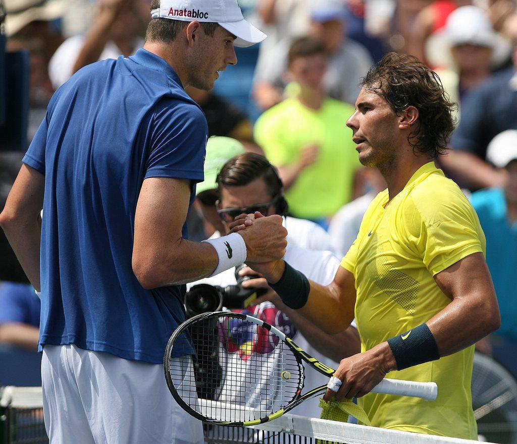 Isner (à gauche) n'a pas perdu une seule fois son engagement. [KEYSTONE - Mark Lyons]