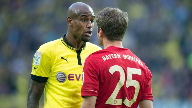 Borussia et Bayern croiseront le fer pour la cinquième fois de la saison samedi. [KEYSTONE - Bernd Thissen]