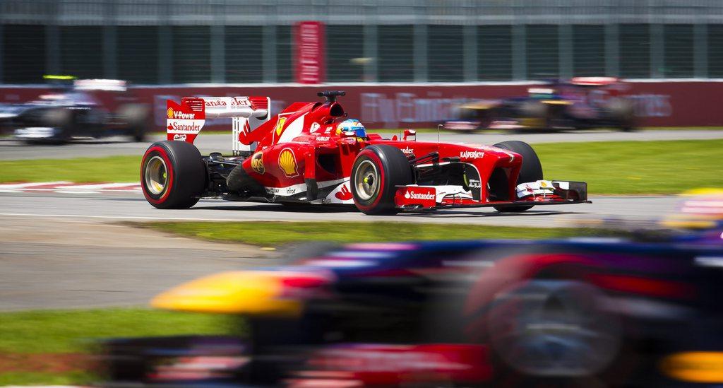 Fernando Alonso fête son quatrième podium de la saison à Montréal. [ANDRE PICHETTE]