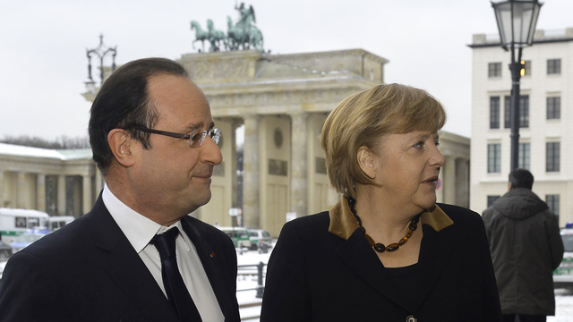 François Hollande et Angela Merkel se sont retrouvés ce mardi matin 22.01.2013 à l'ambassade de France à Berlin pour la suite des cérémonies. [Odd Andersen]