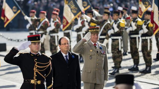Le président français François Hollande a été hué lors de la commémoration du 11 novembre. [EPA/Keystone - Ian Langsdon]