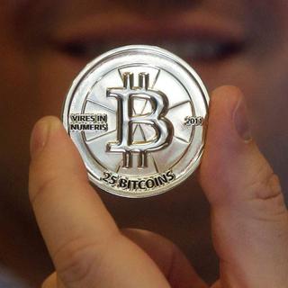 Bitcoin, dont quelques pièces ont tout de même été frappées, est une devise virtuelle qui se veut libre et ouverte. [Rick Bowmer]