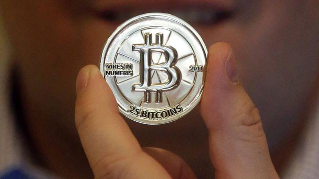 Bitcoin, dont quelques pièces ont tout de même été frappées, est une devise virtuelle qui se veut libre et ouverte. [Rick Bowmer]
