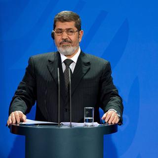 Le président égyptien Mohamed Morsi compagnie de la chancelière allemande Angela Merkel, le 30 janvier à Berlin. [Sven Hoppe / EPA]