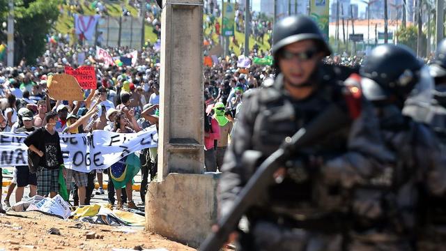 Une mobilisation a eu lieu en marge du match Brésil-Mexique à Fortaleza. [ANTONIO LACERDA]