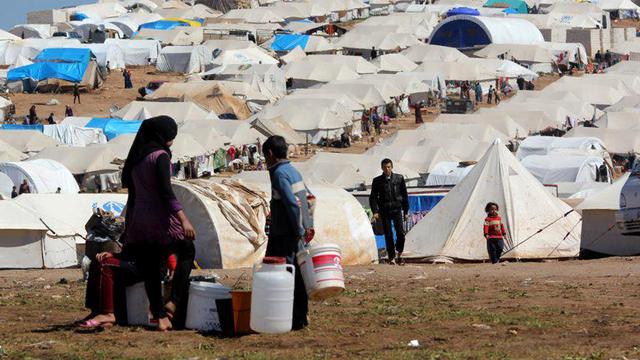 Syrie, réfugiés [Keystone - AP Photo/Aleppo Media Center AMC]